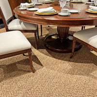 Table setup with chairs, close view of pedestal base.