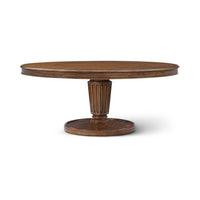 Front view of round dining table, pedestal detail.