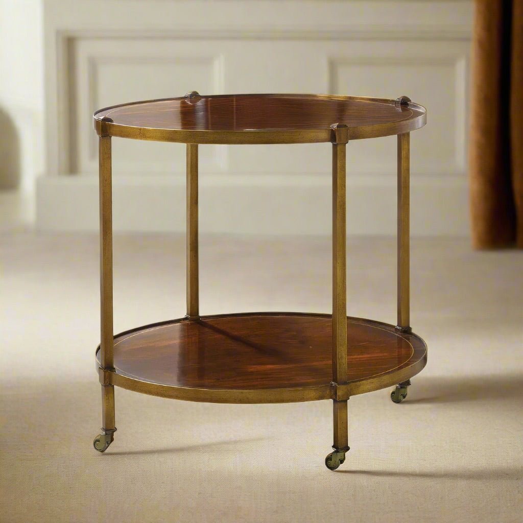 Brass end table on carpeted floor, classic design.