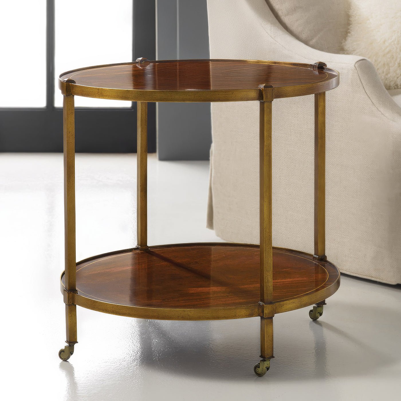 Elegant brass end table by a sofa, living room.