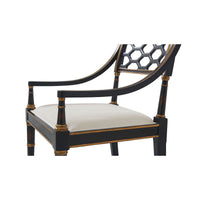 Regency style armchair, close-up of seat and armrests, refined finish.
