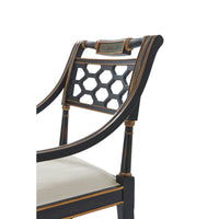 Regency style armchair, close-up of backrest, intricate woodwork.