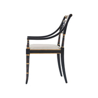 Regency style armchair, side view, curved armrests.