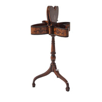Open butterfly table, revealing hollow interior storage space.