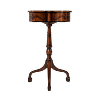 Side view of accent table with carved wooden details.