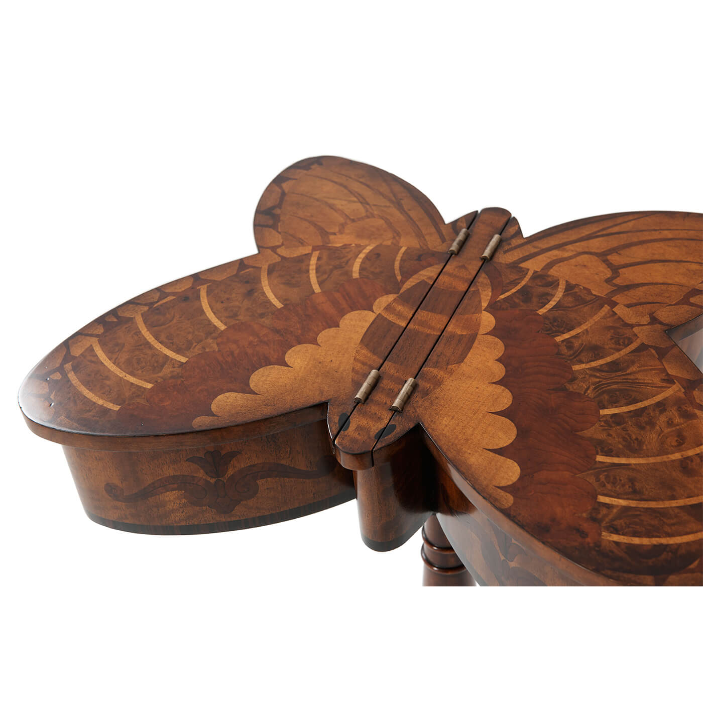 Close-up of butterfly table's wood inlay and hinges.