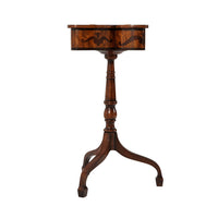 Angled view of pedestal base and butterfly table.