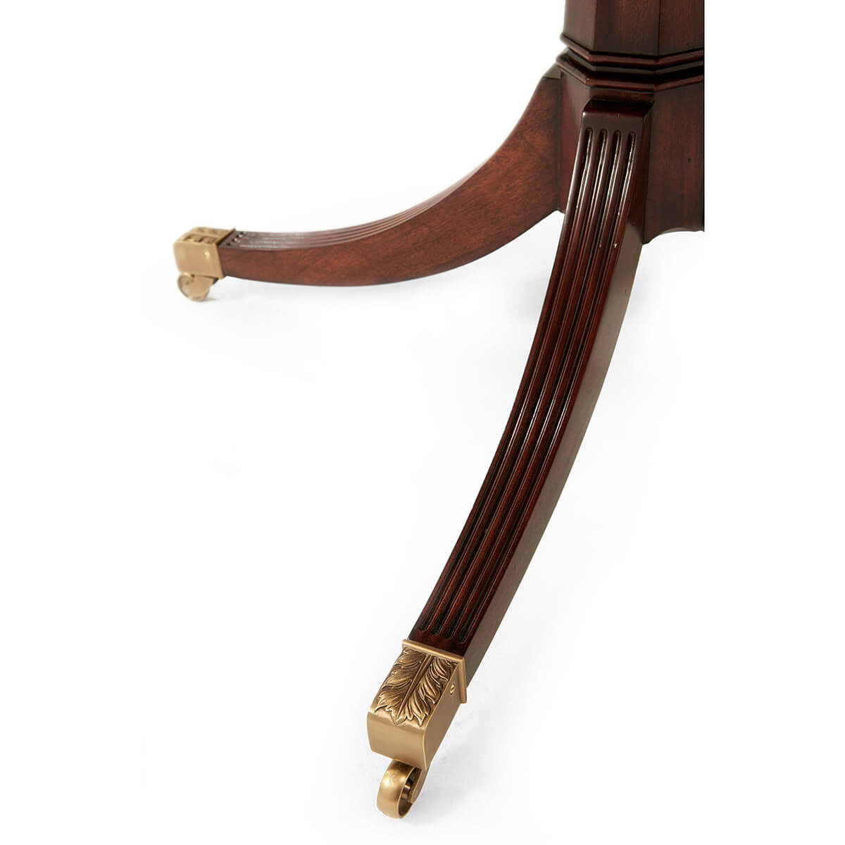 Close-up leg with brass accents, Regency style table.