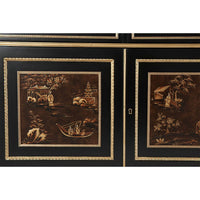 Close-up of decorative panels on Regency style cabinet front.