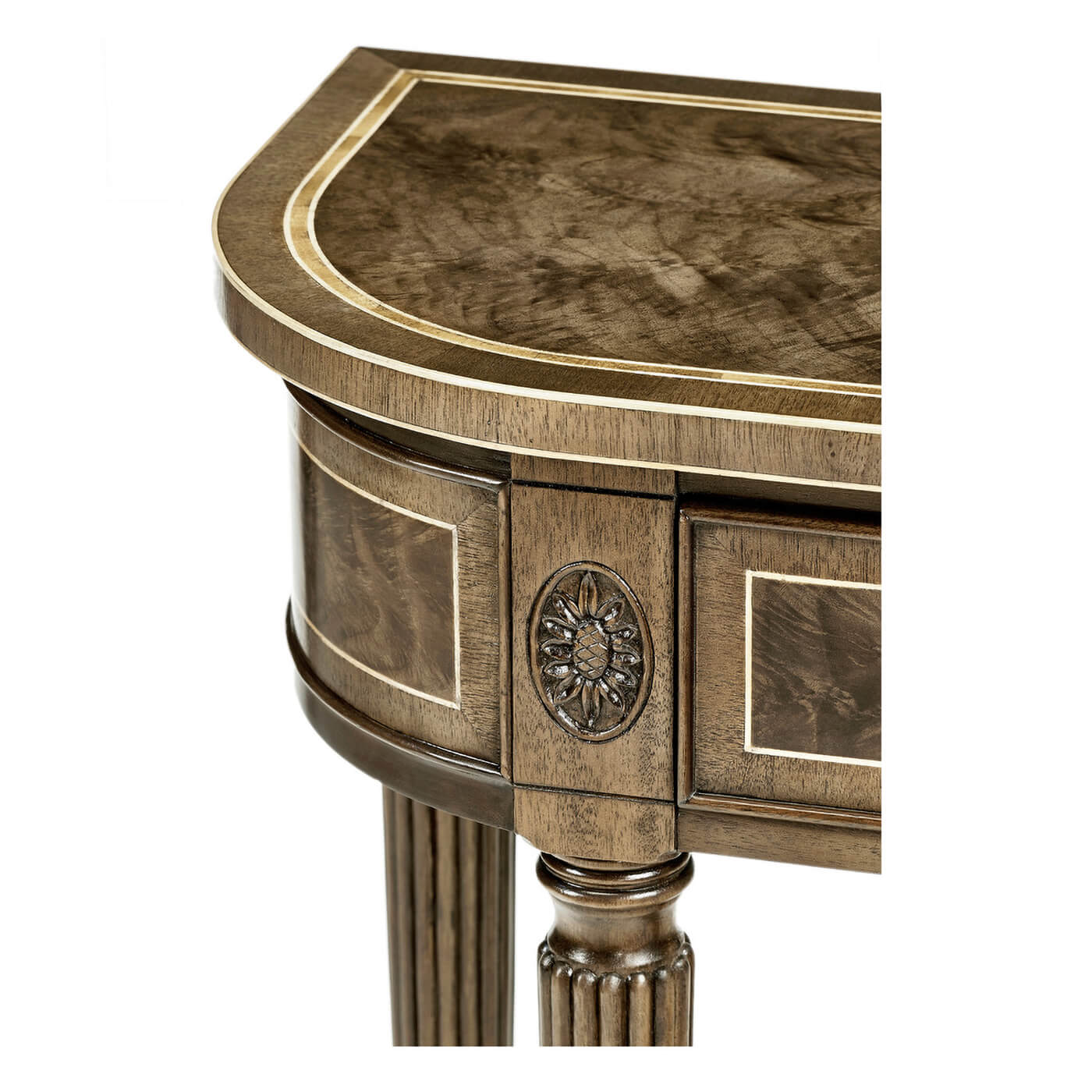Close-up of console table corner, intricate woodwork detail.