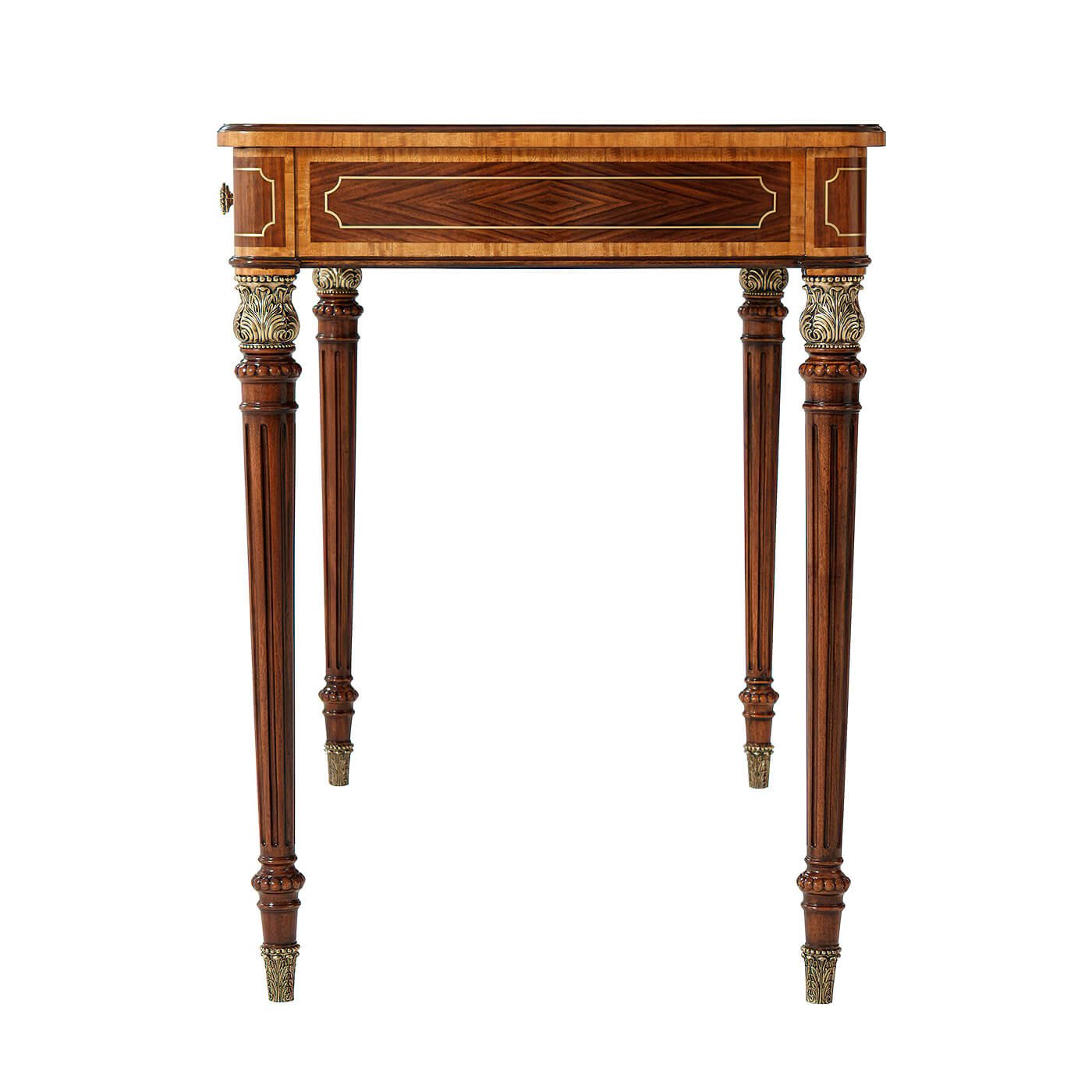Side view of Regency style desk, showing ornate leg design.