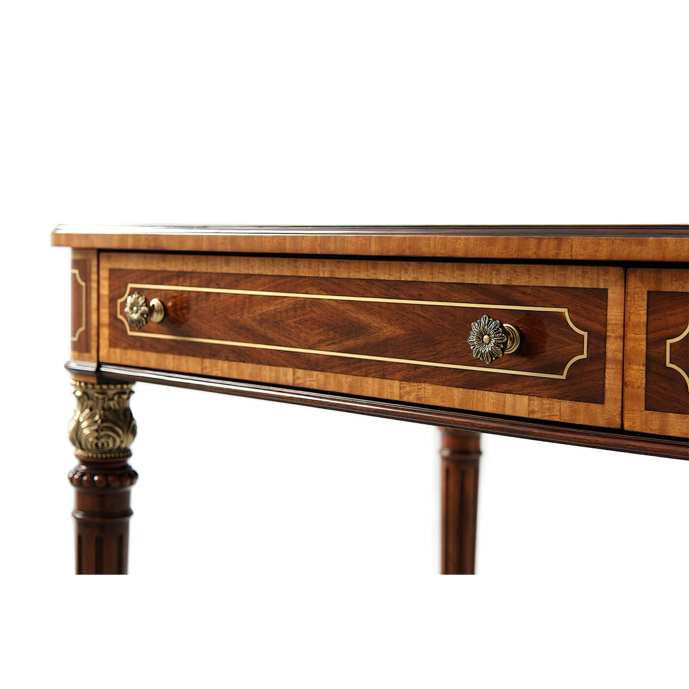 Close-up of Regency style desk drawers, elegant knob details.