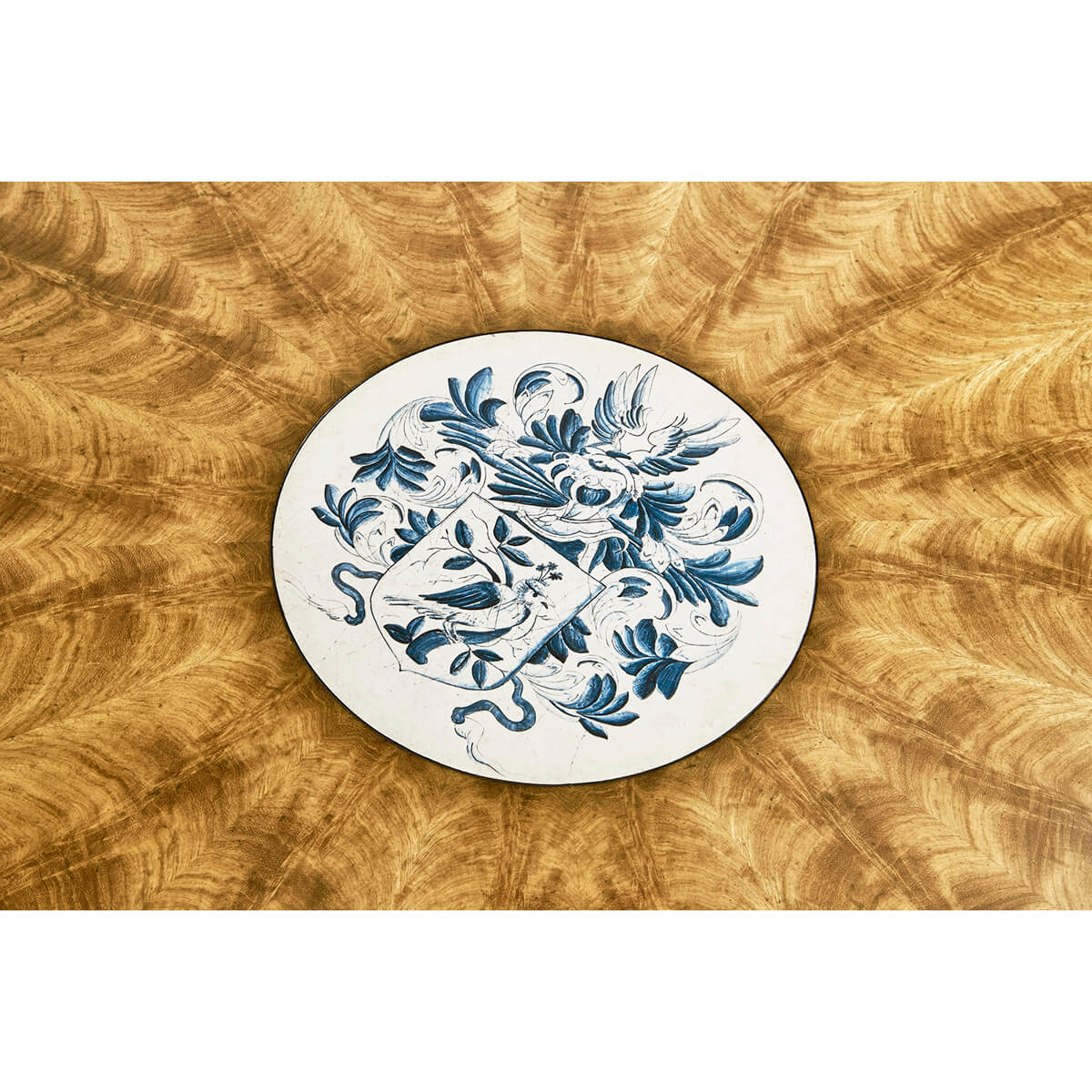 Central motif on regency style dining table top.