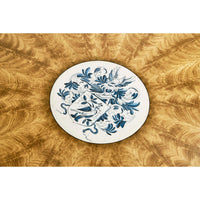 Central motif on regency style dining table top.