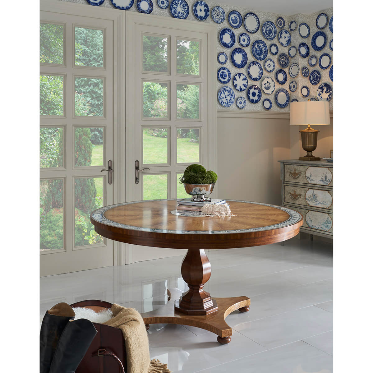Regency table in bright room with decor accents.