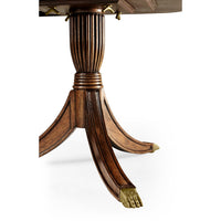 Regency dining table leg detail with claw foot.