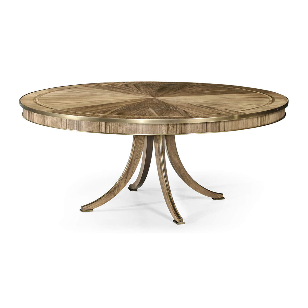 Round regency style golden dining table, angled view.