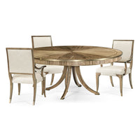 Regency style dining table with four upholstered chairs.