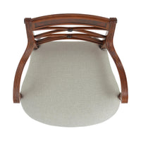 Top view of cushioned Regency style mahogany armchair.