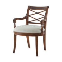Front angled view of Regency style mahogany armchair.