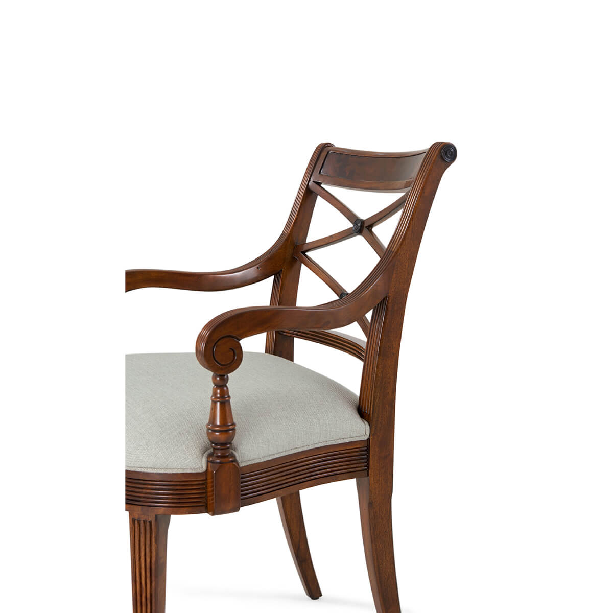 Close-up side detail of Regency style mahogany armchair.