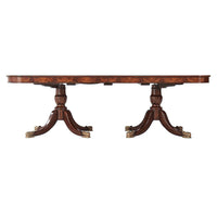 Side view of mahogany table showcasing pedestal design.