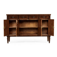Opened doors of mahogany sideboard revealing storage.