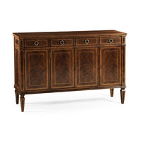Angled view of mahogany sideboard showing design details.