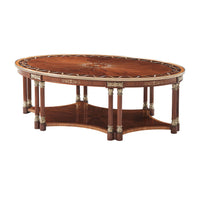 Oval coffee table with intricate wood pattern, angled view.