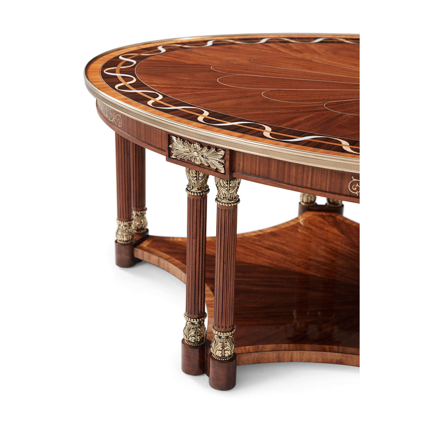Partial view of oval coffee table, focusing on leg details.