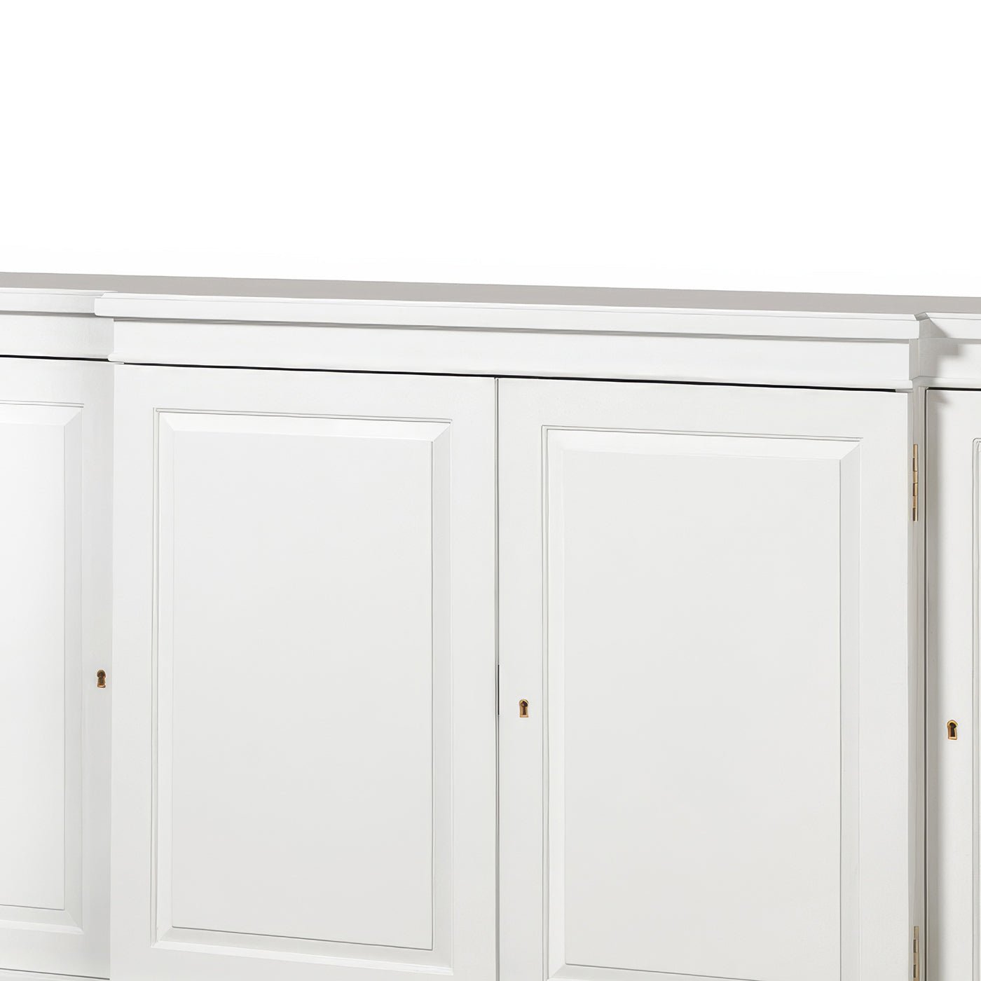 Close-up of Regency style credenza door details, white finish.