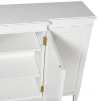 Interior shelves of Regency style credenza with door open.