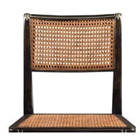 Close-up of Regency style chair's woven backrest and seat.