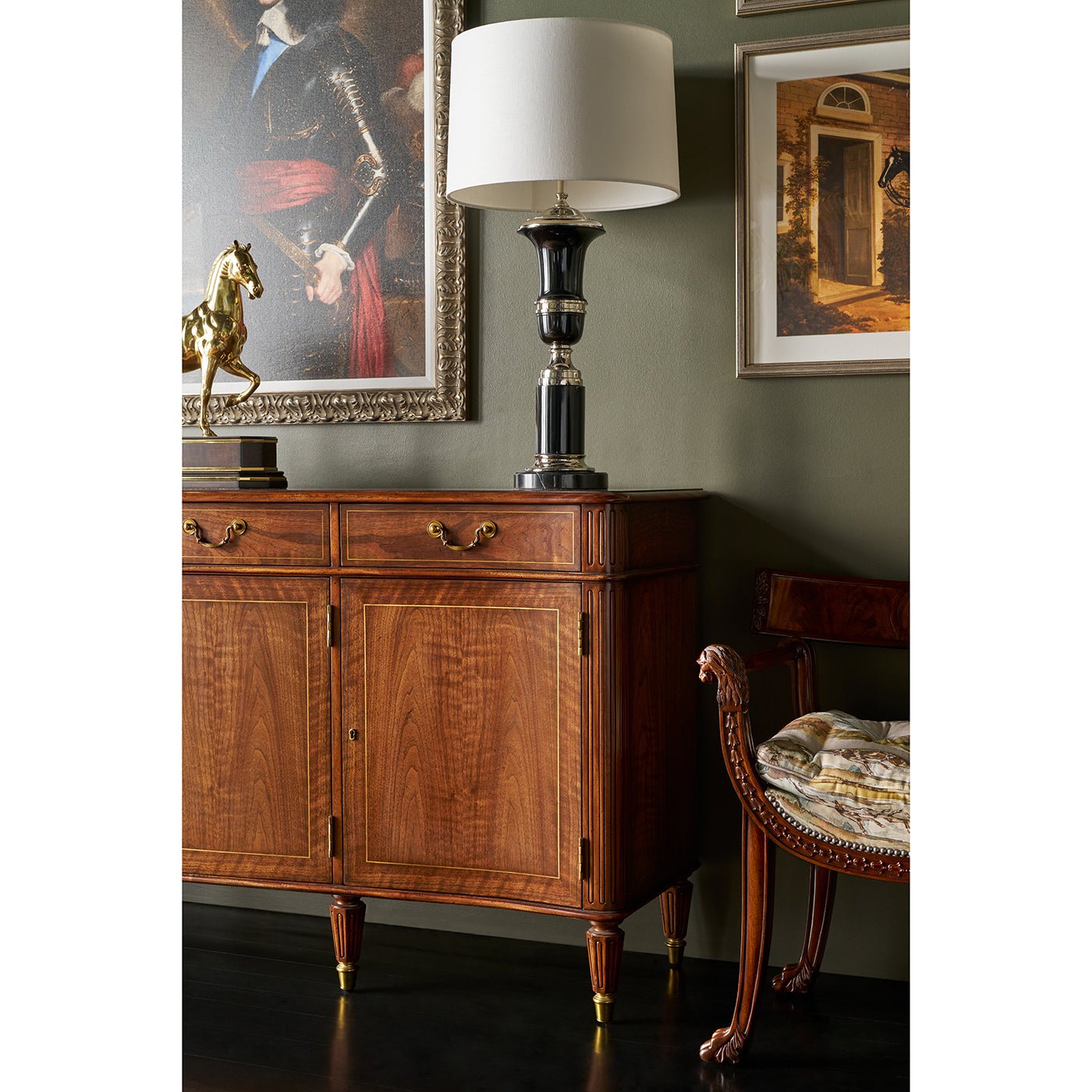 Regency style sideboard buffet in decorated room setting.