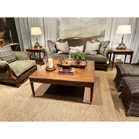Elegant coffee table in decorated living room setup.