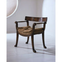 Regency style armchair with beige cushion, white floor.