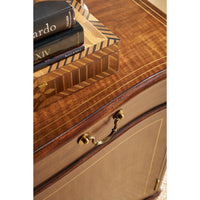 Cabinet top view with decor, highlighting wood finish.