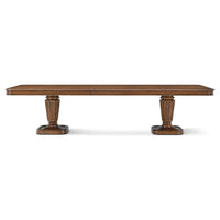 Front view of walnut dining table, elegant pedestal design.