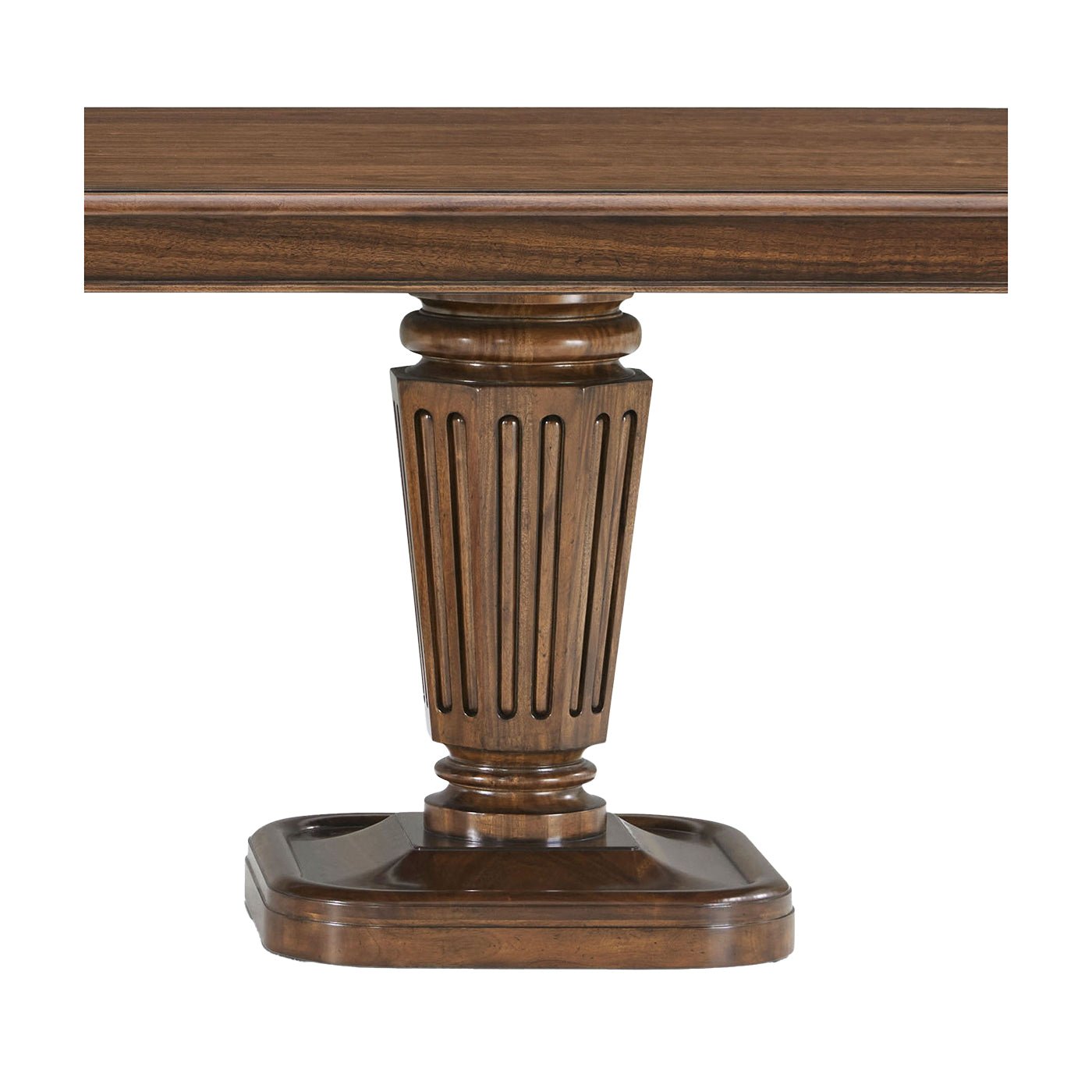 Side view of pedestal, fluted design on walnut table.