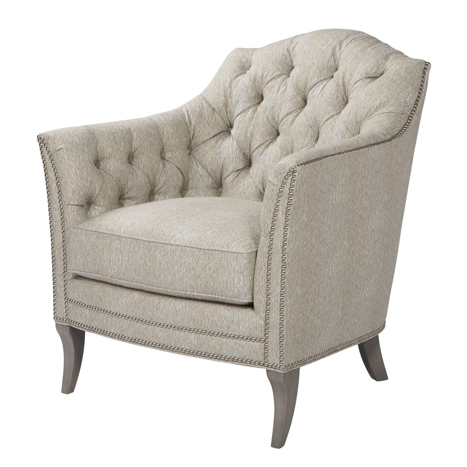 Light upholstered tufted chair, angled view with wooden legs.