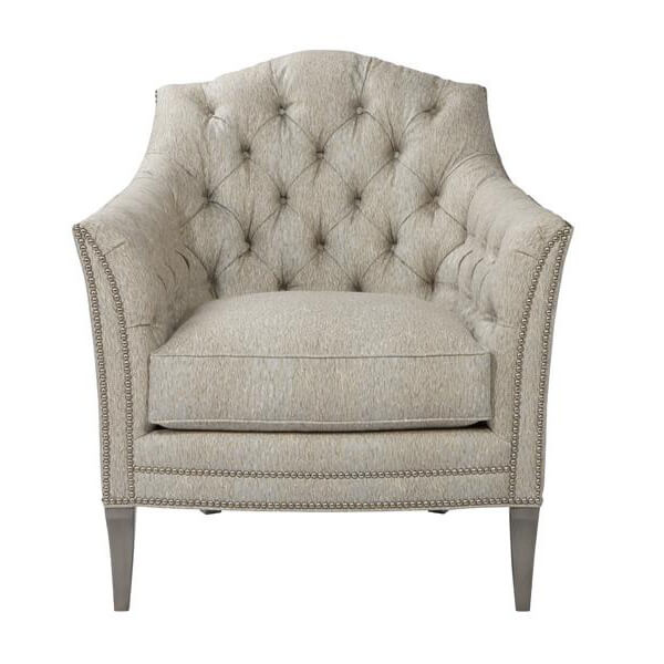 Light upholstered tufted chair, front view emphasizing tufted back.