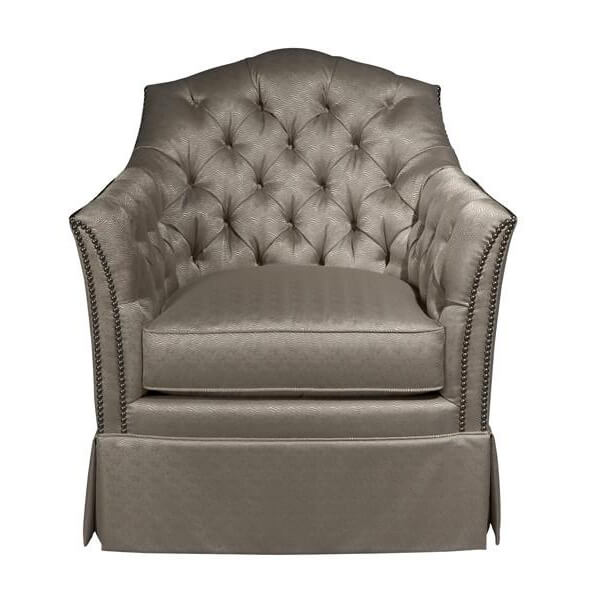 Upholstered tufted chair, front view highlighting cushion design.