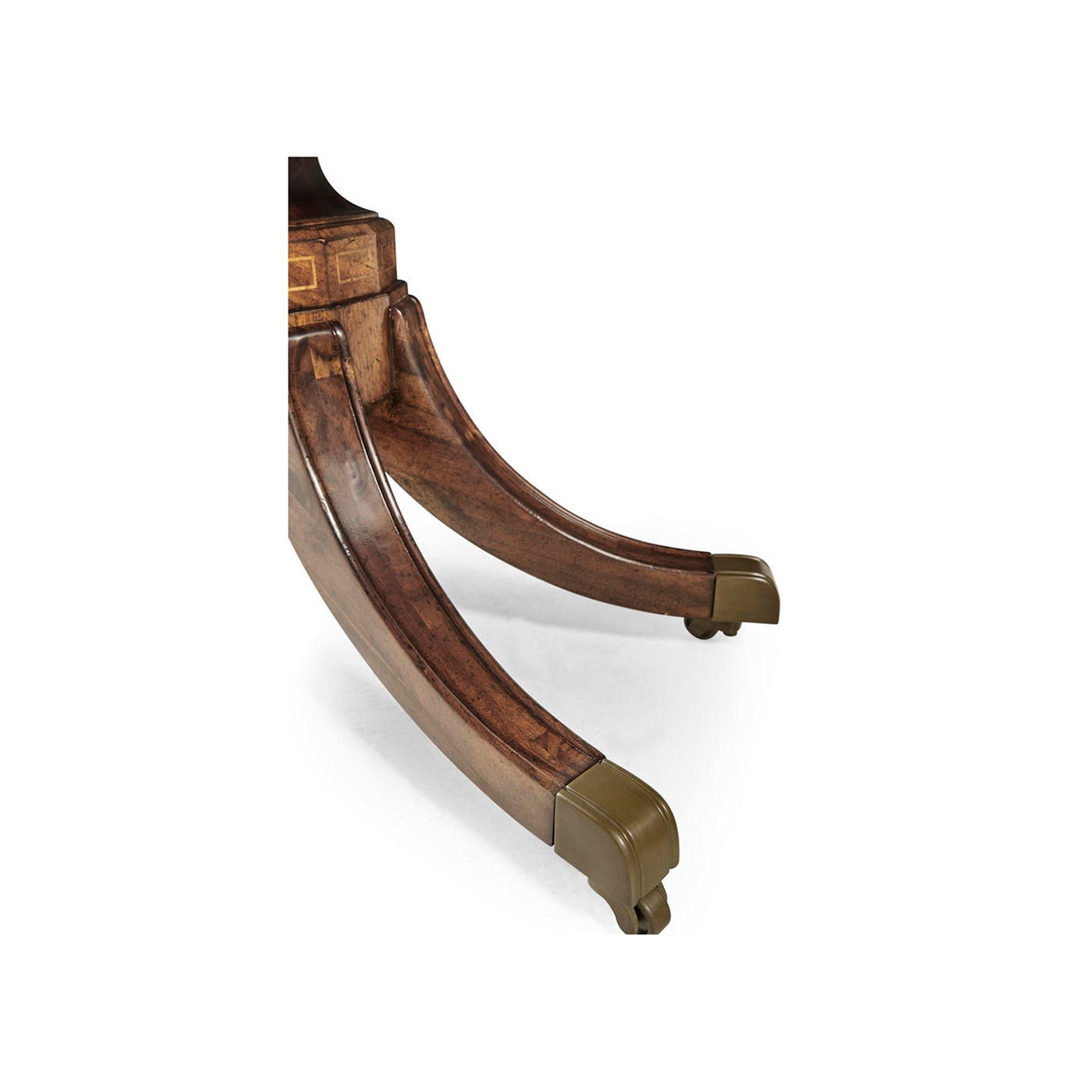 Brass caster detail on Regency walnut console table leg.
