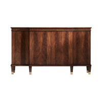 Elegant Regency walnut credenza front view with brass feet.