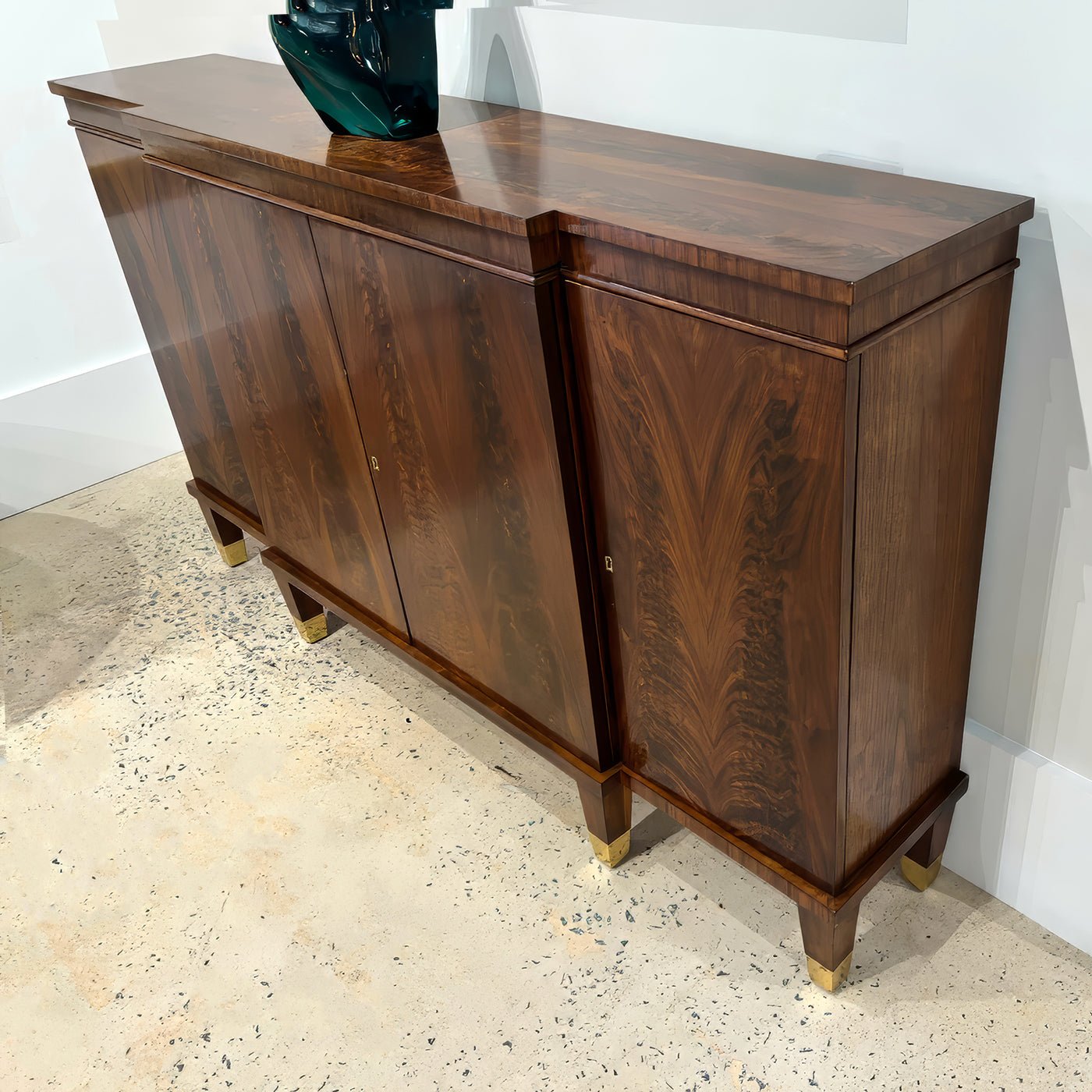Top view of walnut credenza showcasing wood grain detail.