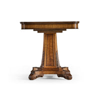 Side view of Regency walnut pedestal center table.