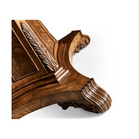 Decorative base design on Regency walnut center table.