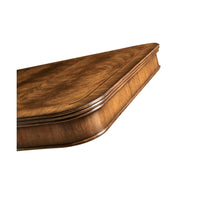 Edge detail of Regency walnut center table.