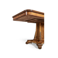 Under-table view of Regency walnut pedestal center table.