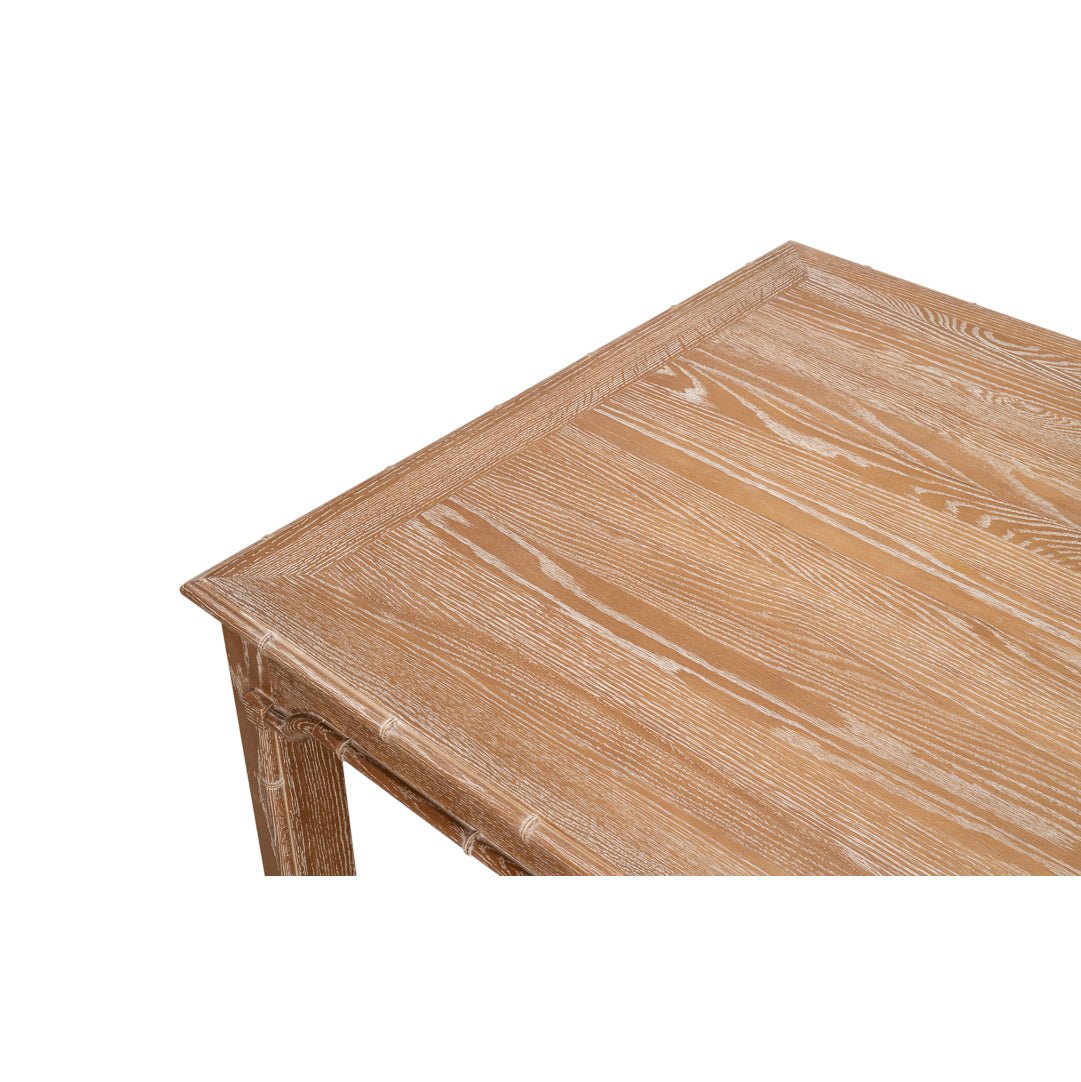 Close-up of table corner and wood grain.